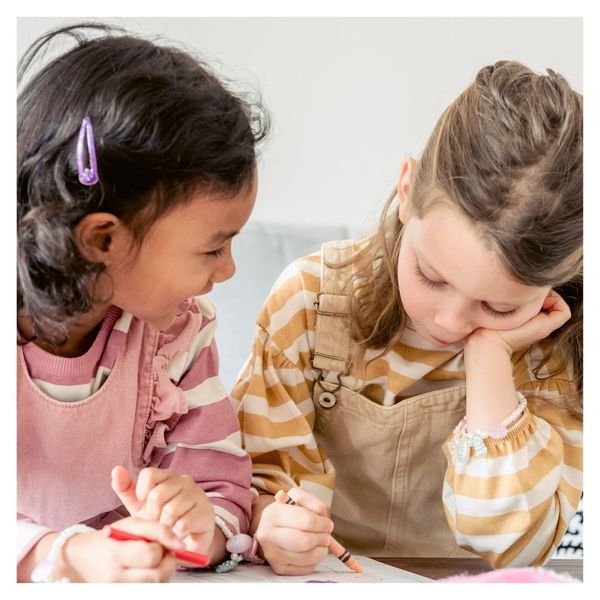 two little girls talking together