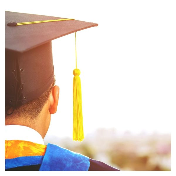 profile view of student wearing graduation cap