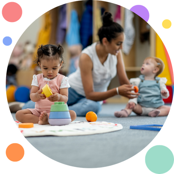 infants happily playing in daycare