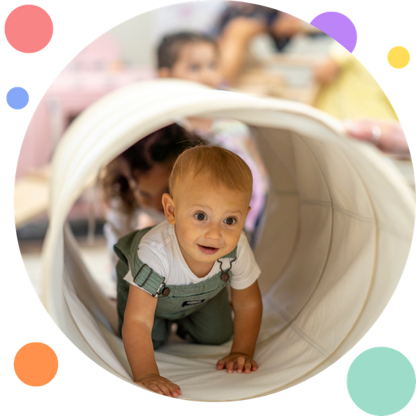 baby crawling through a tunnel