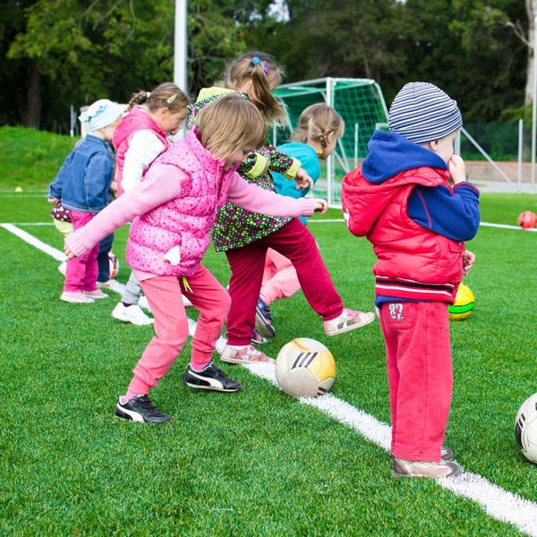 Children playing soccer