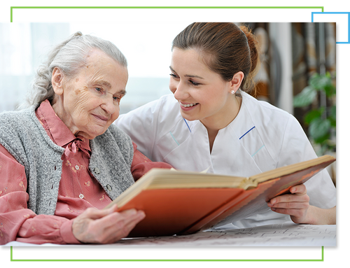 Woman reading with elder at home