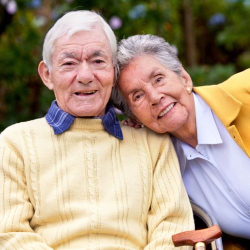 smiling elderly couple