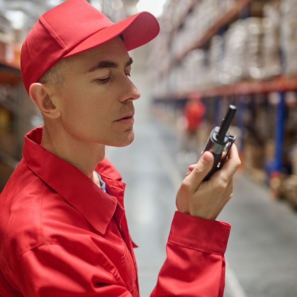 man using two way radio