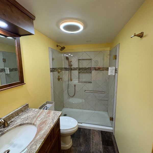 Yellow bathroom painted by Apex Coating Company