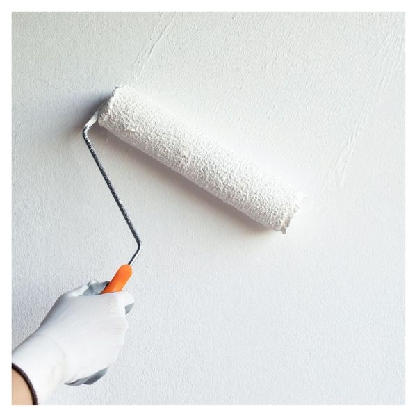 painting roller on wall