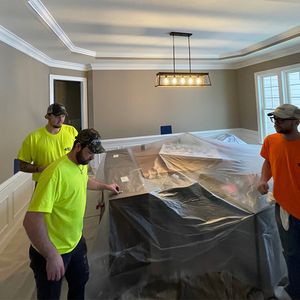 painters covering dining set