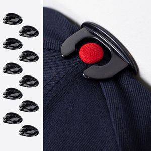 A detailed image of The Original Squatchee™ adhesive hat hook holding a hat, showcasing its unique patented design and secure fit for hat collections. Close-Up of Hat Hook in Use