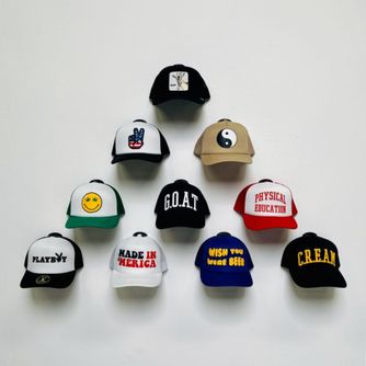 A pyramid-shaped baseball cap display arranged with The Original Squatchee™ patented adhesive hat hooks. Growing Baseball Cap Collection