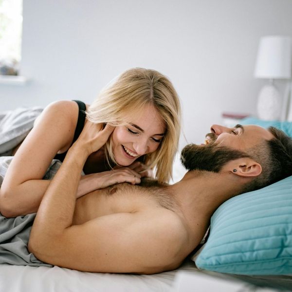 Happy young couple sharing an intimate and joyful moment together.