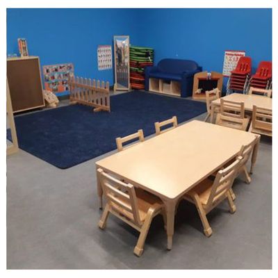 small children table and chairs with play mat and small farm fence for playtime