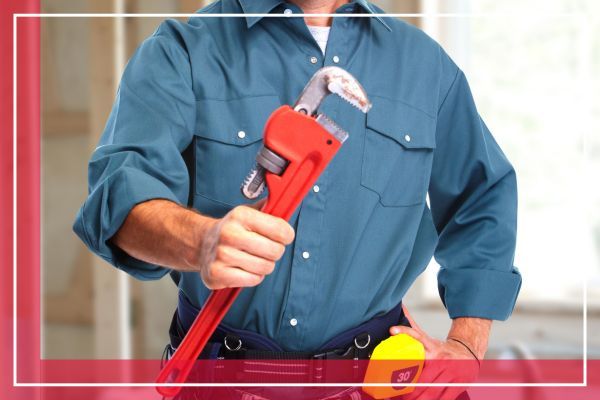 plumber with wrench