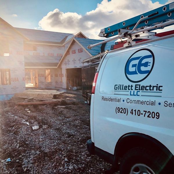 image of the Gillett Electrician LLC van in front of a residence