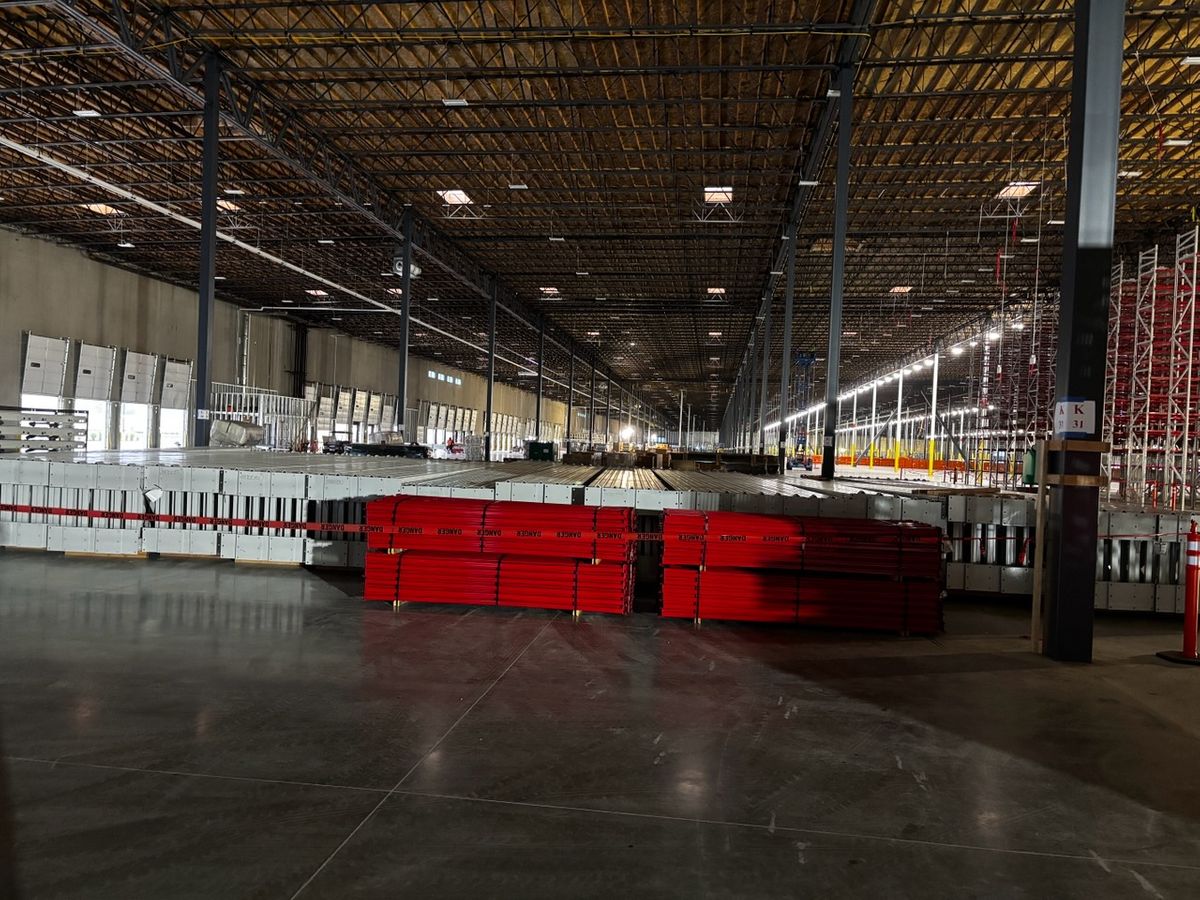Rack components organized and staged to support an efficient, controlled installation workflow. Material Staging & Site Coordination