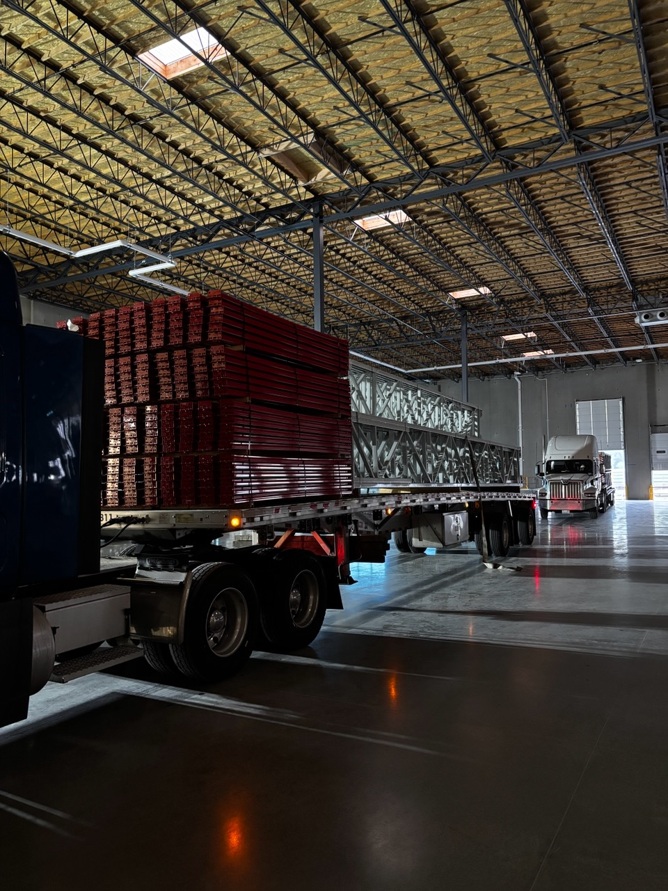Truckloads of rack materials received, unloaded, and staged to keep large-scale installation crews productive and on schedule. Coordinated Rack Delivery & Unloading