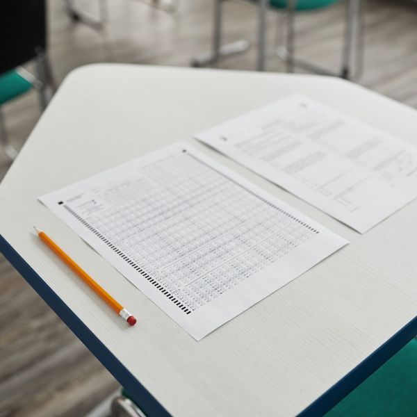 Paper test on a school desk. Paper test on a school desk.