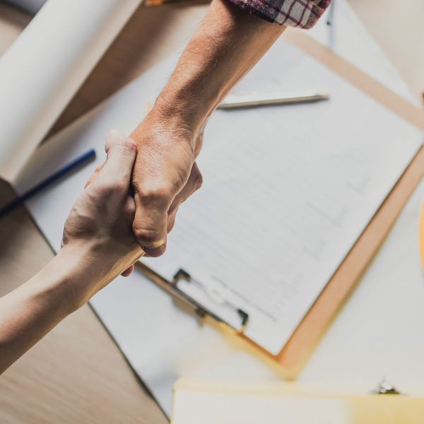 Two people shaking hands