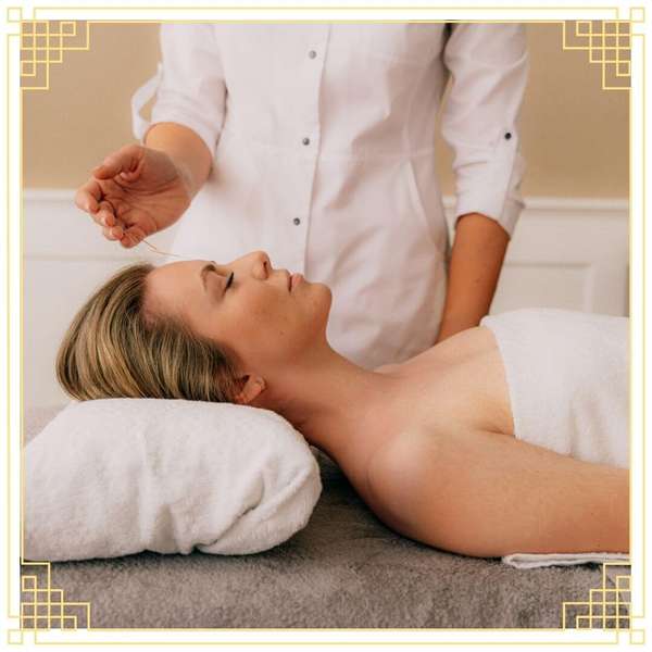 woman receiving acupuncture