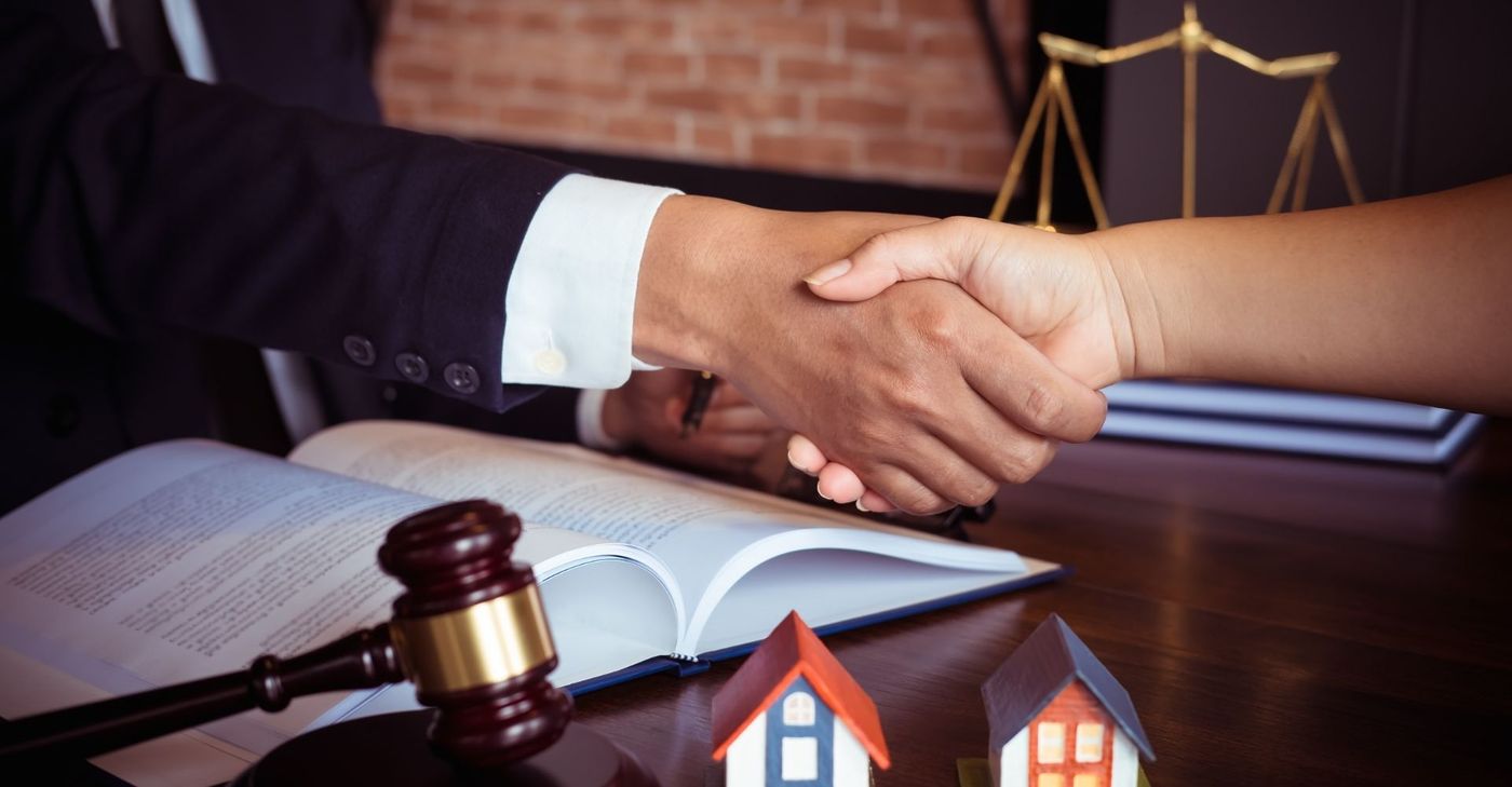 Lawyer Shaking Client's Hand