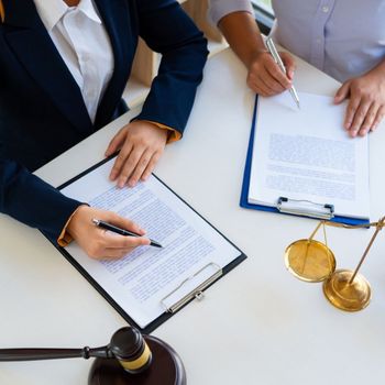 Lawyers Working On Contracts