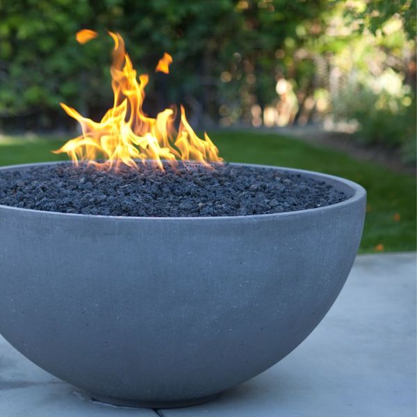 home with concrete fire pit