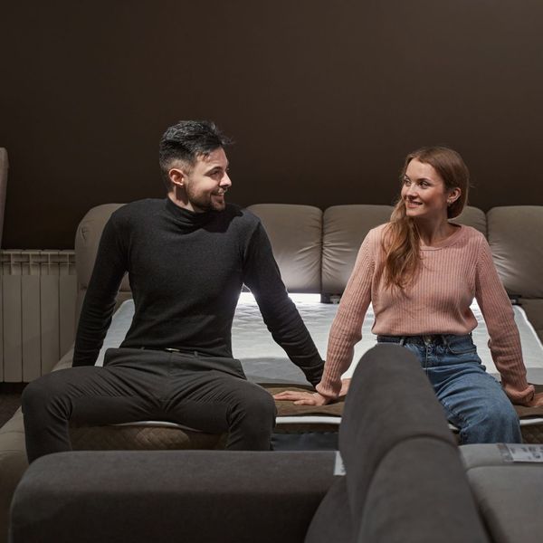 couple sitting on bed