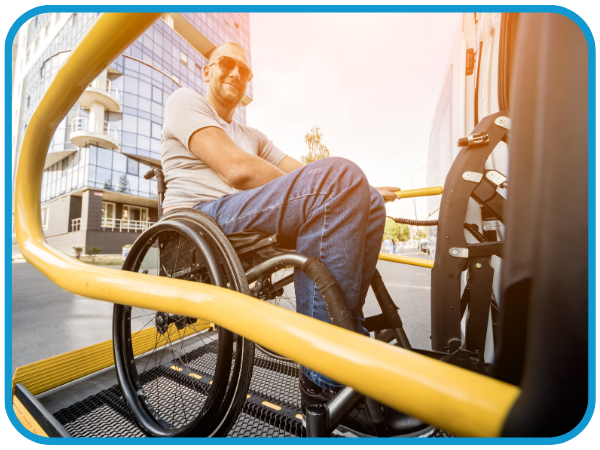 Man in Wheelchair getting in van Man in Wheelchair getting in van