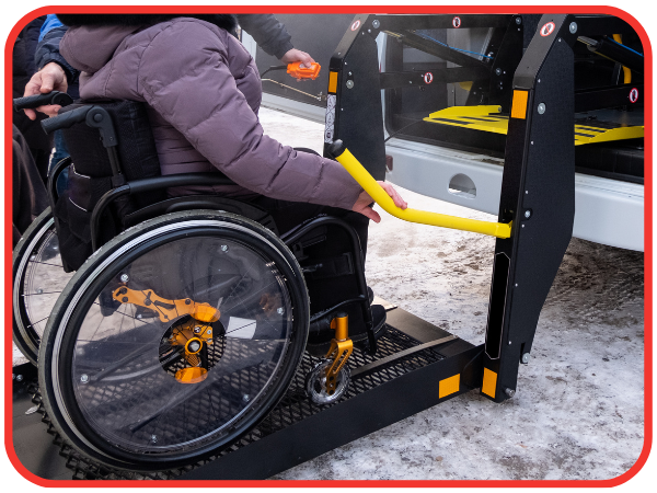 person in wheelchair getting loaded into van person in wheelchair getting loaded into van