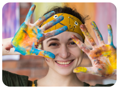 woman with paint on her hands woman with paint on her hands