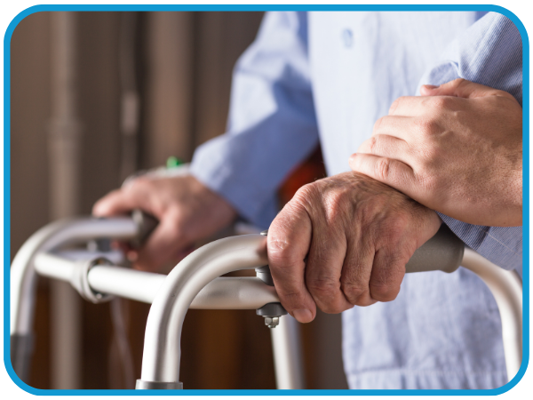 elderly man getting help walking elderly man getting help walking