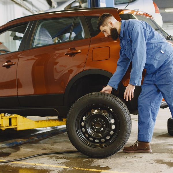 mechanic working on a vehicle