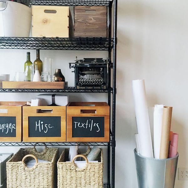 organized baskets and totes on a metal shelving unit