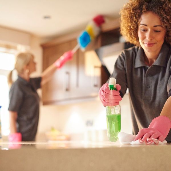 cleaners cleaning kitchen