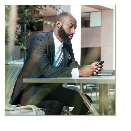 Man planning his credit goals on phone