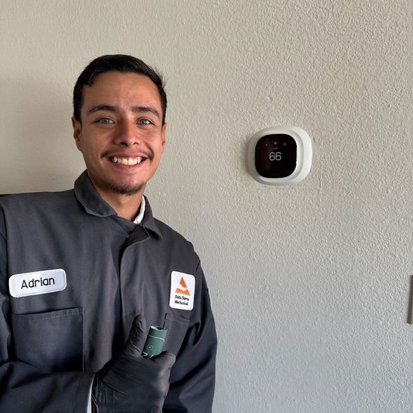 HVAC tech and smart thermostat