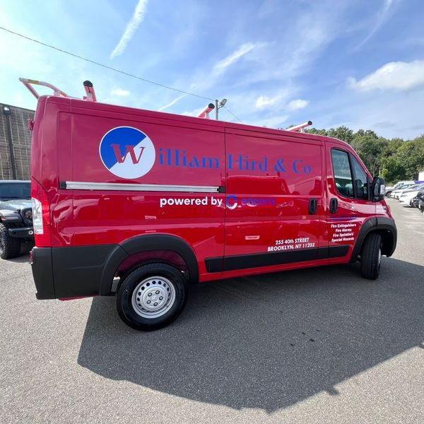 red fleet van with commercial wrap