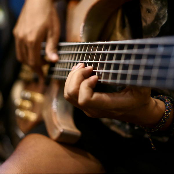 Person playing guitar