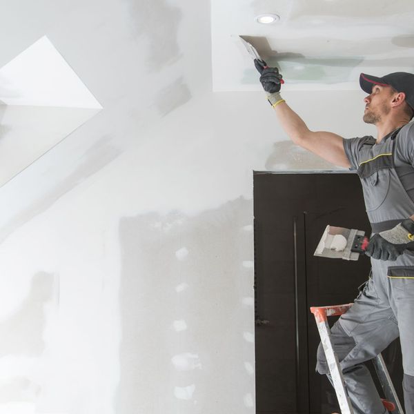 Man doing dry wall