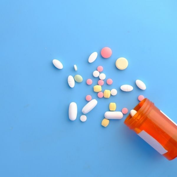 pills coming out bottle