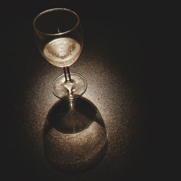 wine glass in dark room
