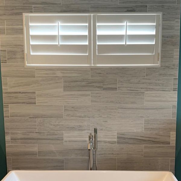 Custom tile wall in bathroom