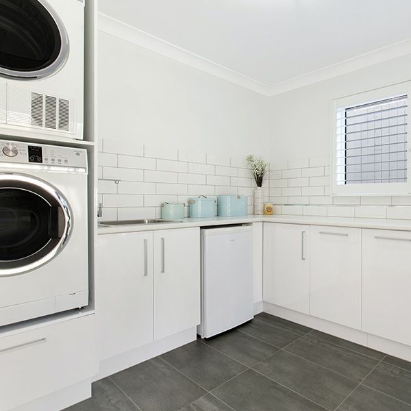 White and gray laundry room