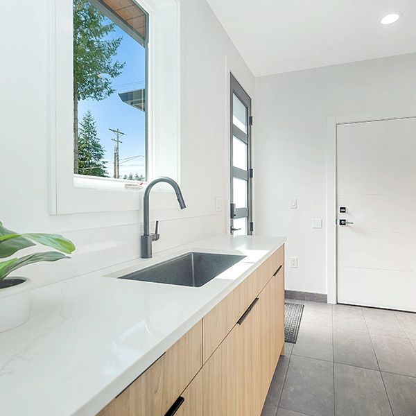 Tile floors in a clean laundry room