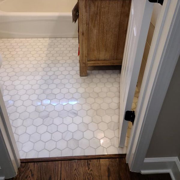 Custom tile floor in bathroom