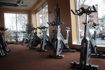 Exercise bikes in a row