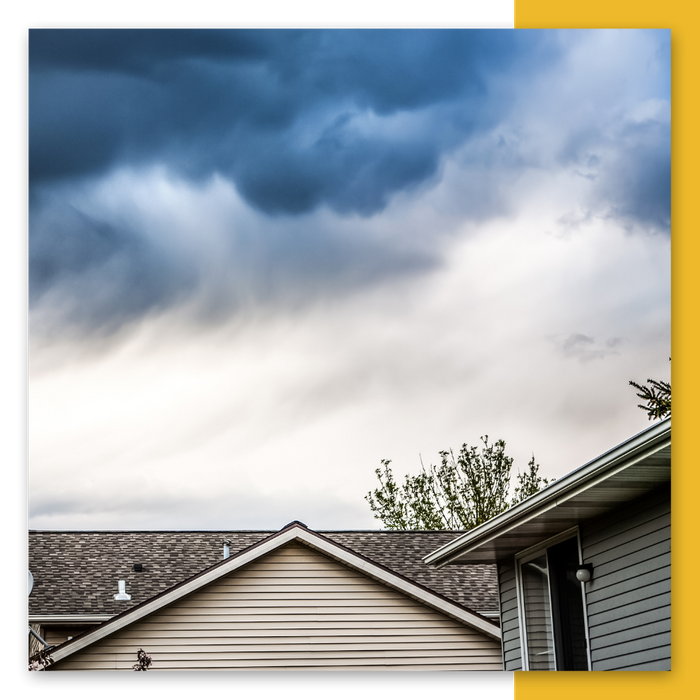 Family home with storm clouds above. Center TX - 2.png