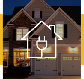 Home illuminated at night with electrical icon overlay