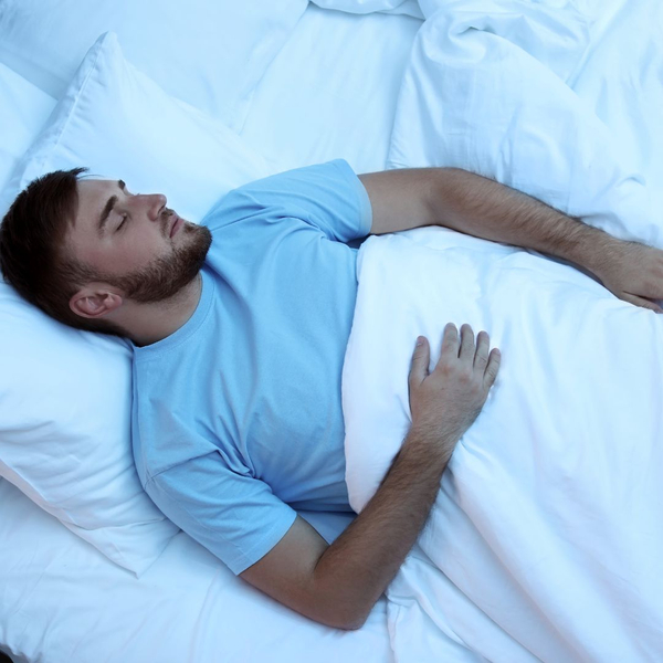 man lying in bed