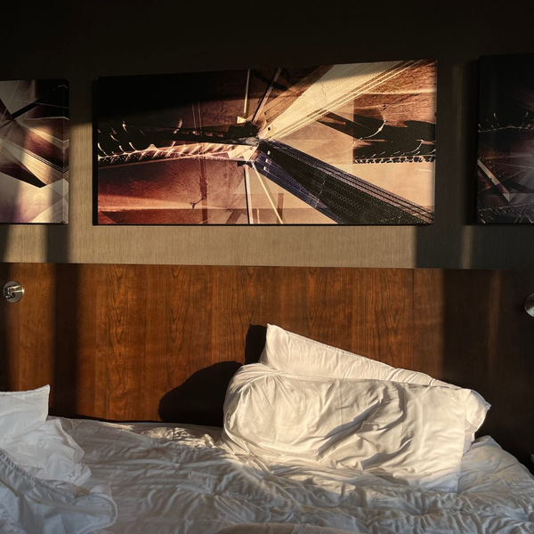 A hotel bed. A hotel bed.