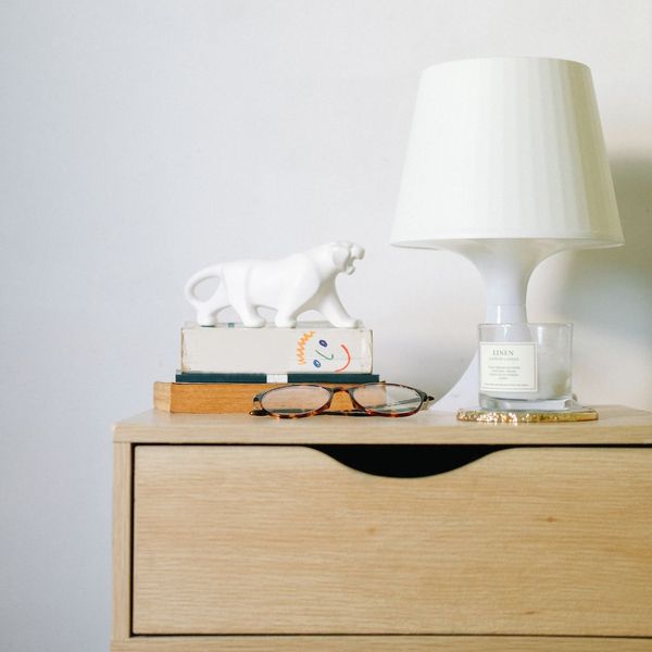 A bedroom nightstand. A bedroom nightstand.